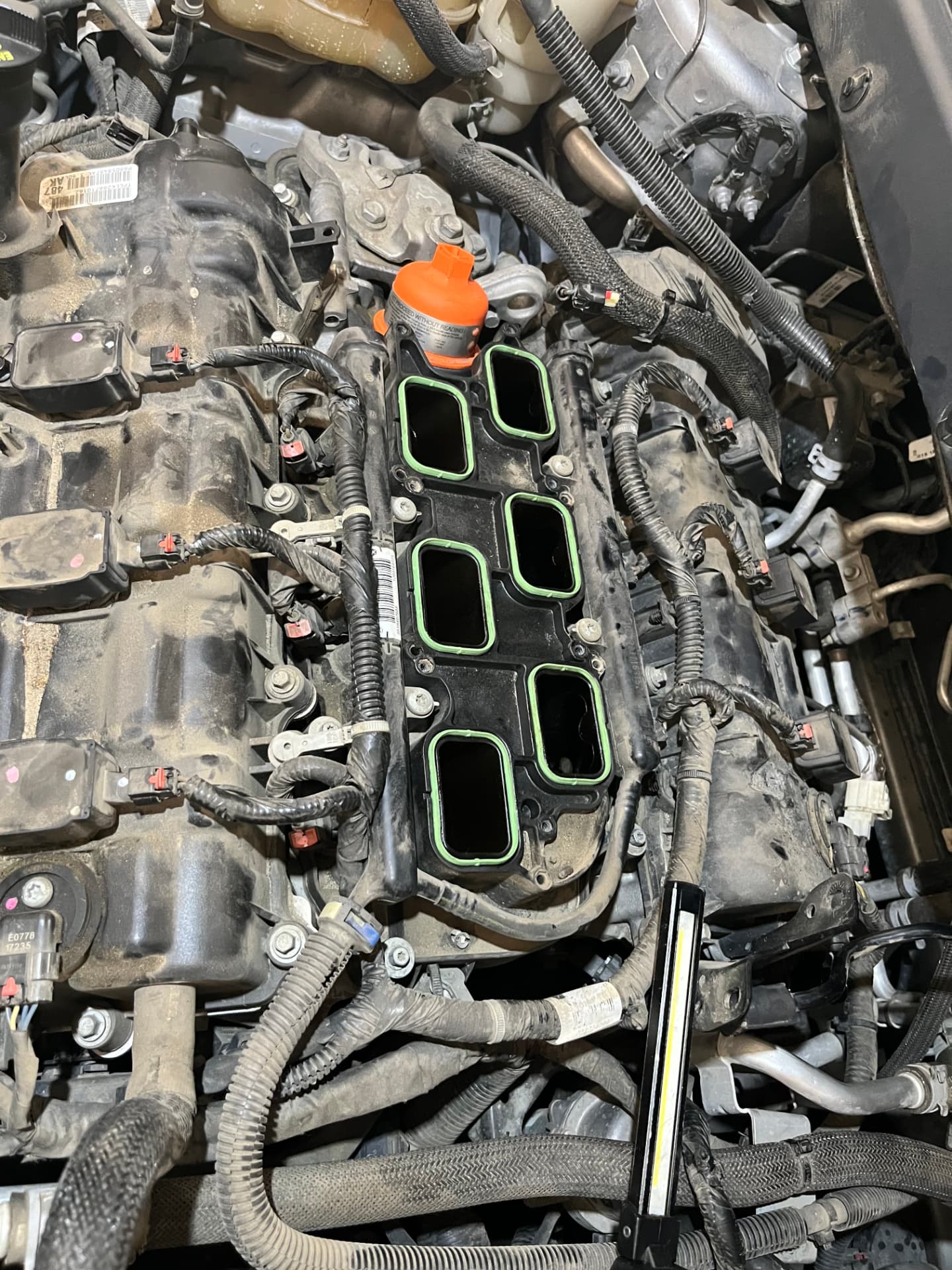Intake manifold removed with new gaskets fitted on a truck engine at Johnny's Auto Repair in Victorville CA