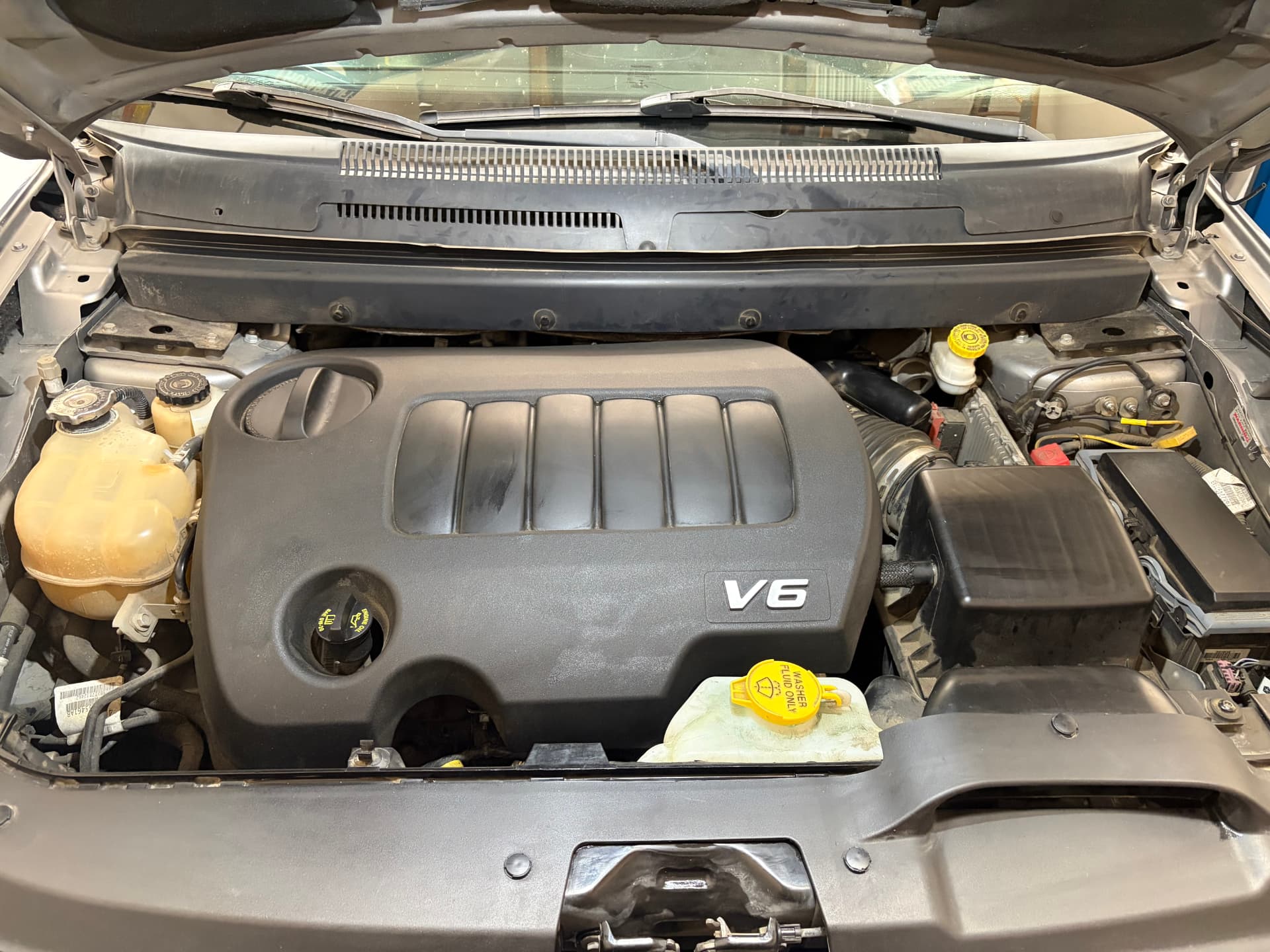 Clean V6 engine bay ready for service at Johnny's Auto Repair in Victorville CA