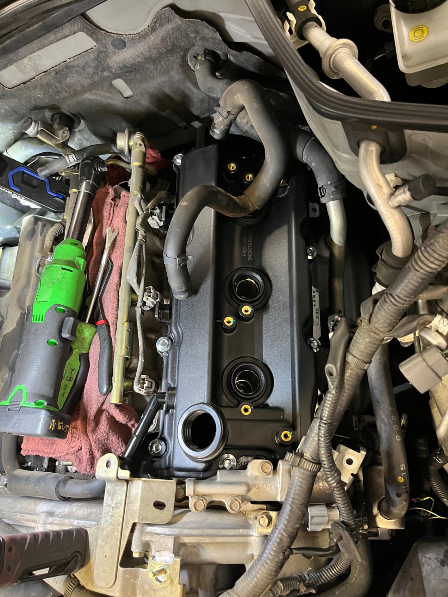 Engine reassembly during an intake manifold replacement at Johnny's Auto Repair near Spring Valley Lake in Victorville CA
