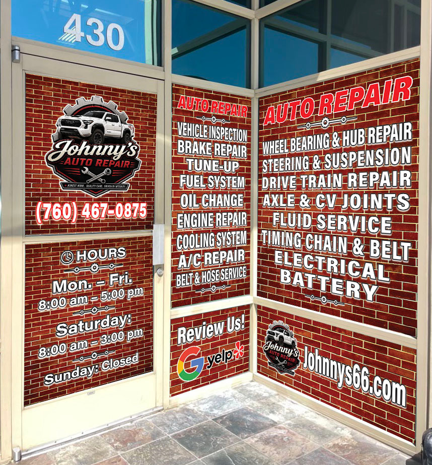 Shopfront windows with Johnny's Auto Repair lettering